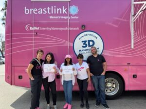 group smiling after free mammogram