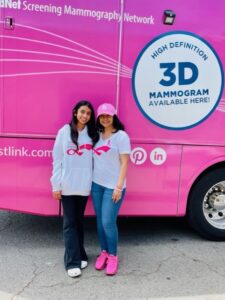 women smiling after free mammogram